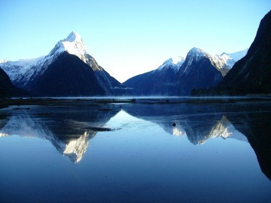 Snow on the top of Mitre Peak, Milford Sound in Spring time