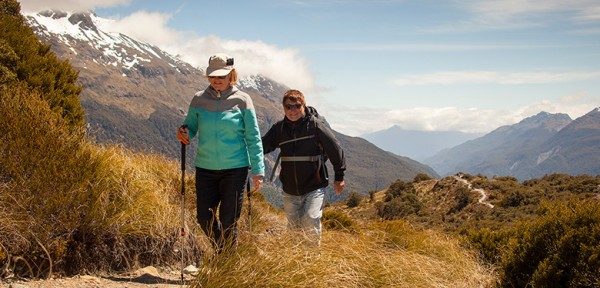 Enjoying the trail at Key Summit on the Routeburn Track