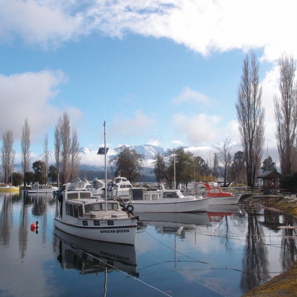 Stroll along the Te Anau lakefront to the boat harbor